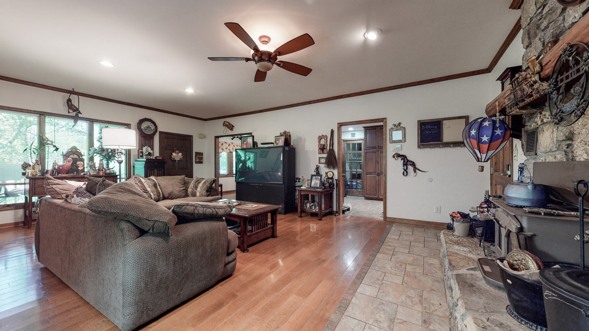 7707 Murfreesboro Road Lebanon, TN 37090 - Photo 13 of 45 a living room with furniture and a flat screen tv