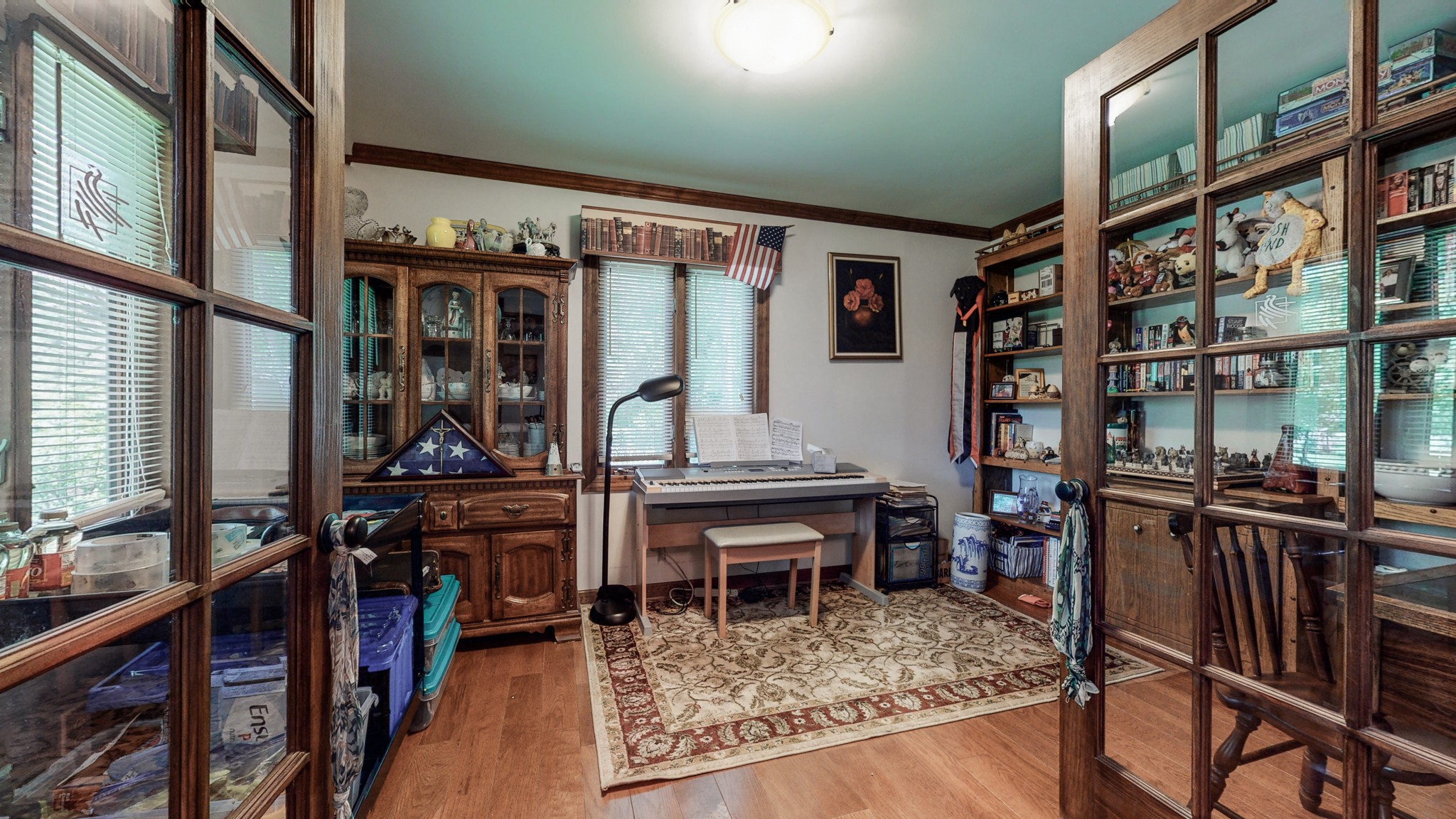 7707 Murfreesboro Road Lebanon, TN 37090 - Photo 21 of 45 a view of a livingroom with furniture window wooden floor and windows