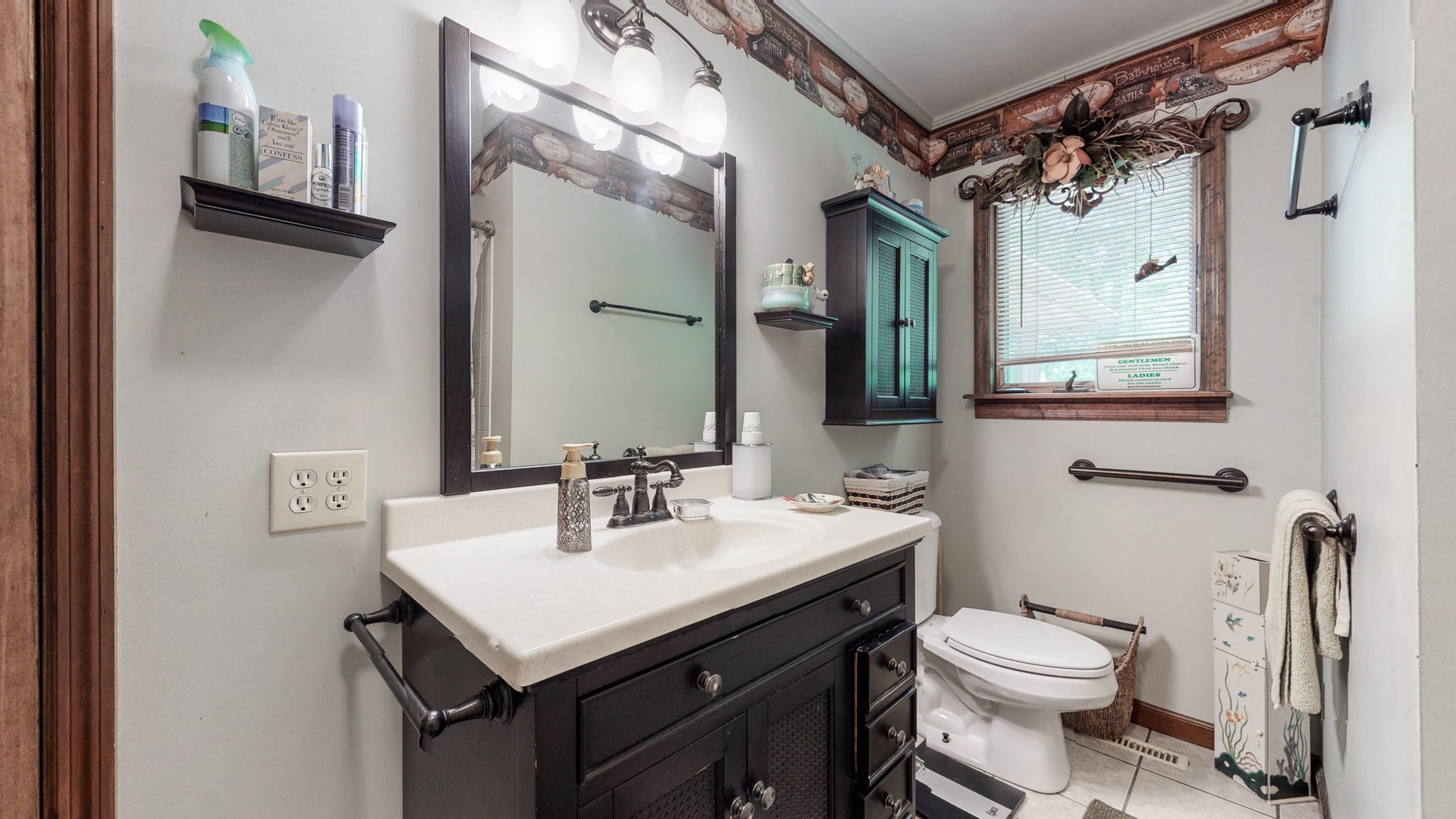 7707 Murfreesboro Road Lebanon, TN 37090 - Photo 23 of 45 a bathroom with a sink toilet and shower