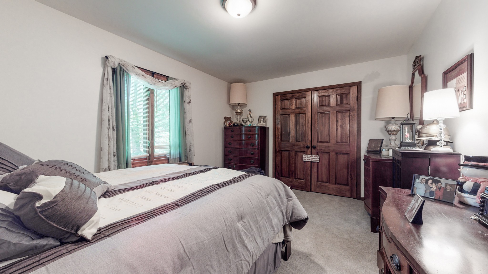 7707 Murfreesboro Road Lebanon, TN 37090 - Photo 25 of 45 a bedroom with a bed and a table