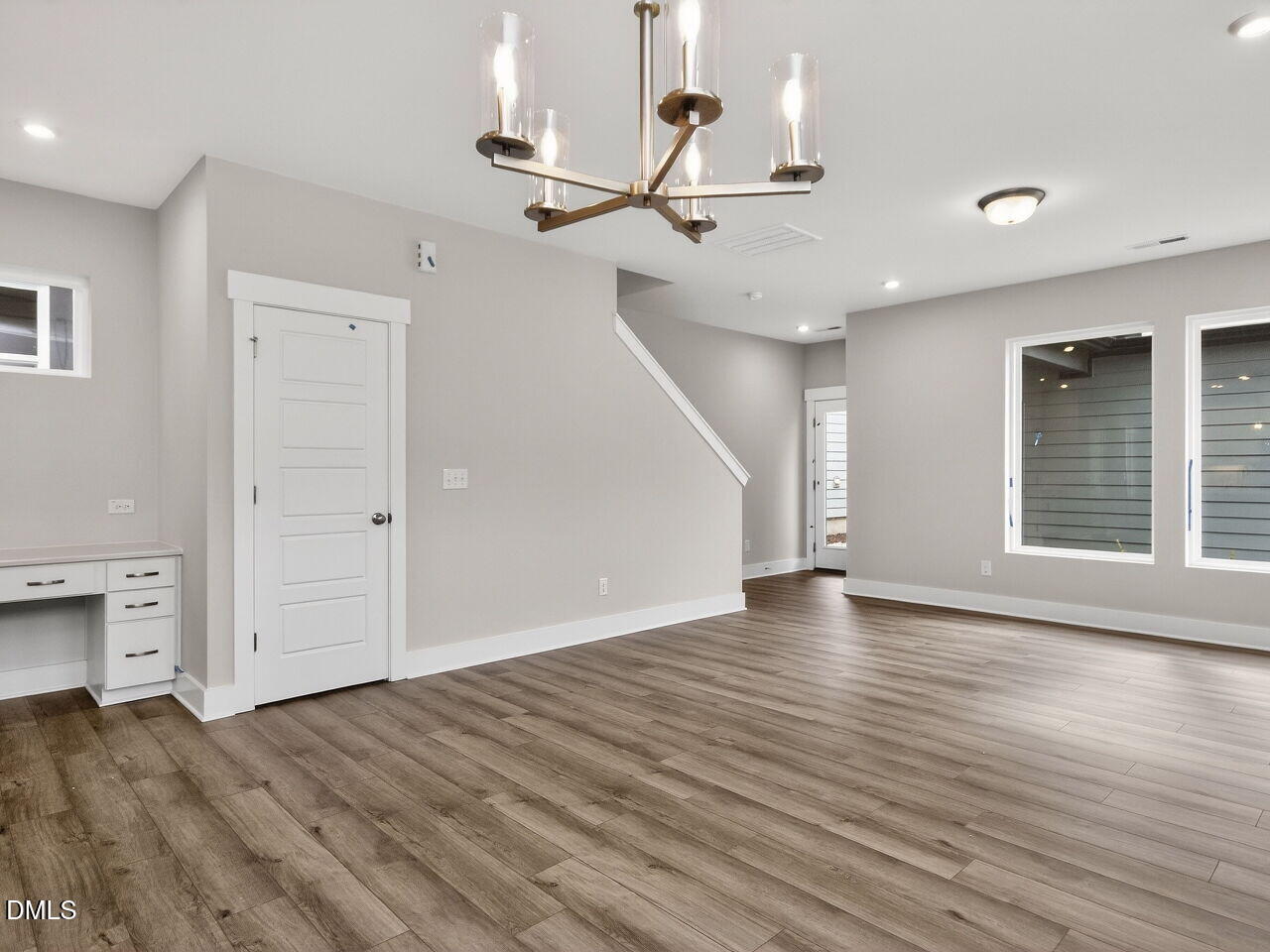 7 Tallgrass Road Pittsboro, NC 27312 - Photo 14 of 37 a view of empty room with wooden floor and ceiling fan