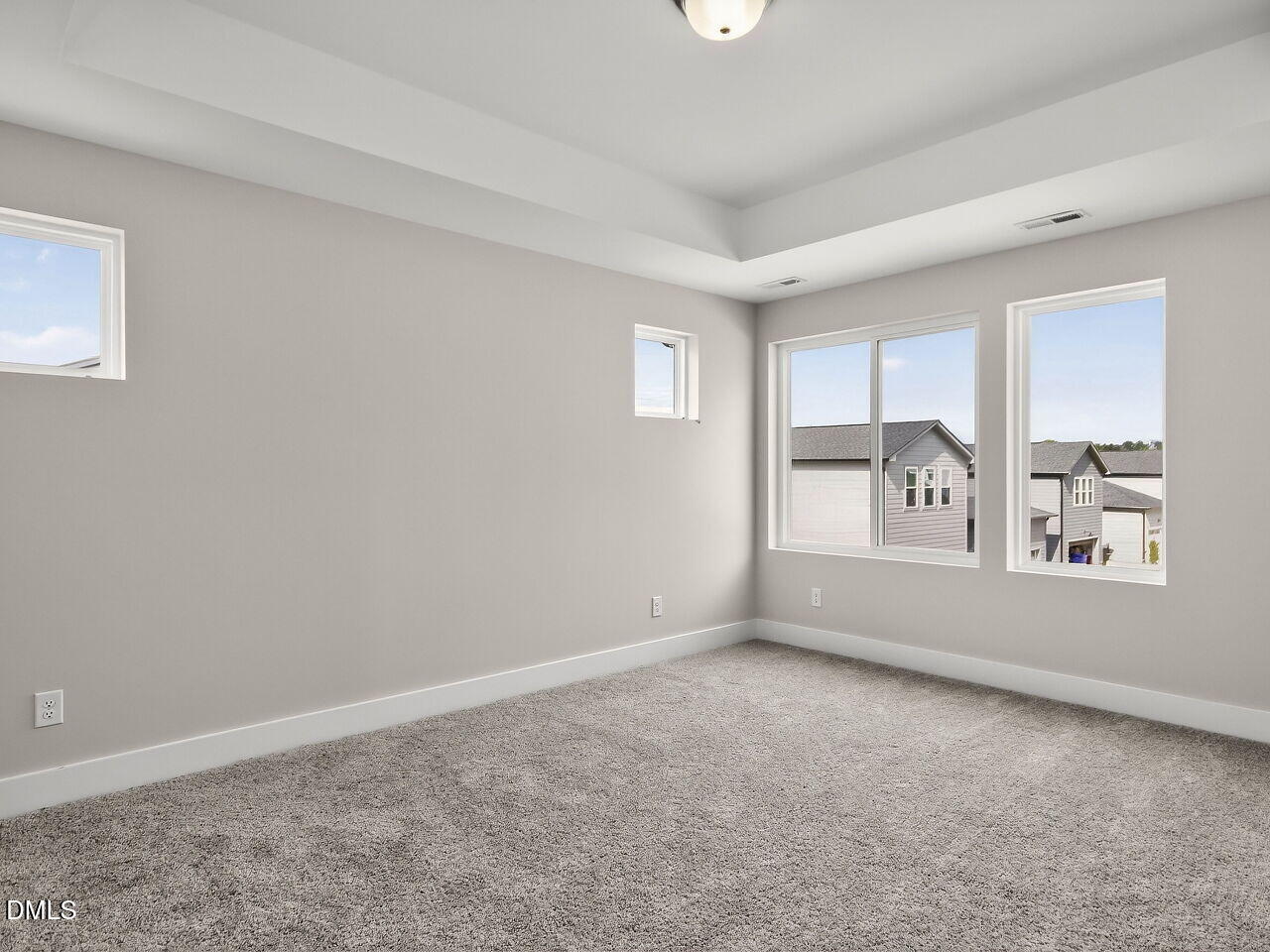 7 Tallgrass Road Pittsboro, NC 27312 - Photo 18 of 37 an empty room with windows