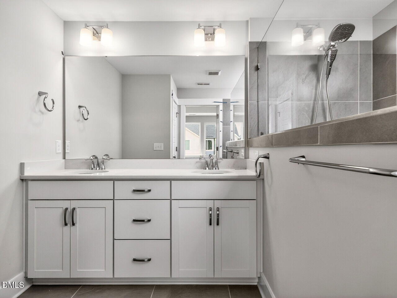 7 Tallgrass Road Pittsboro, NC 27312 - Photo 21 of 37 a bathroom with a sink double vanity and a mirror