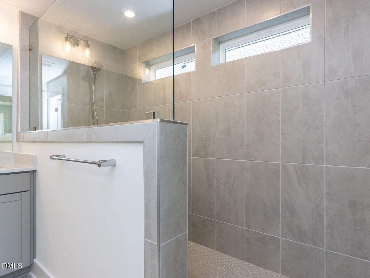 7 Tallgrass Road Pittsboro, NC 27312 - Photo 22 of 32 a bathroom with a shower and a sink