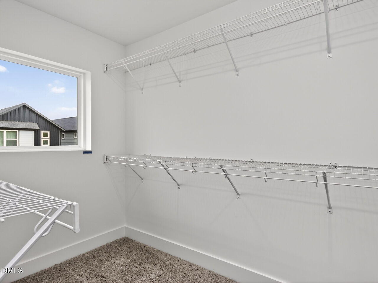 7 Tallgrass Road Pittsboro, NC 27312 - Photo 23 of 37 a view of a room with racks on the wall