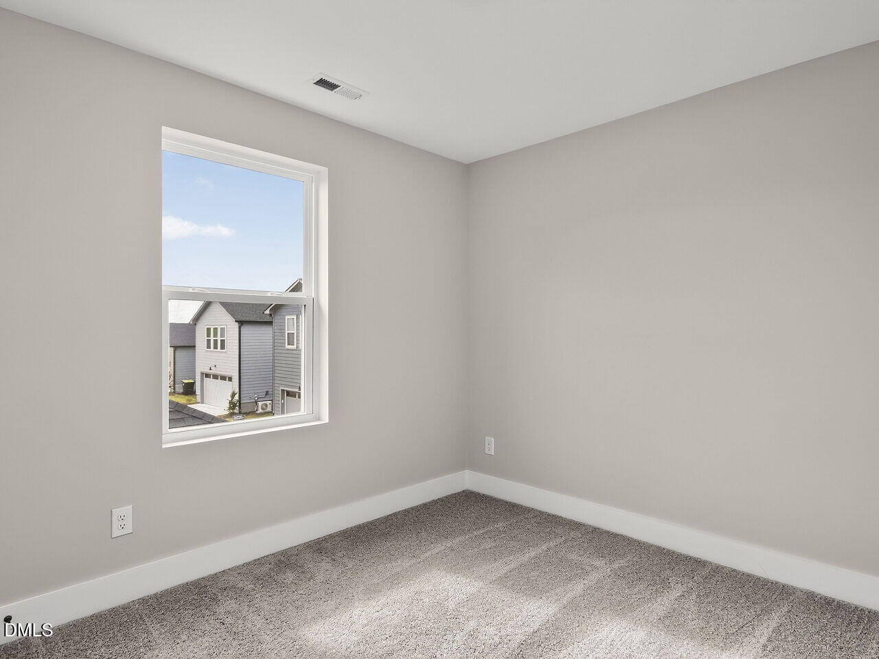 7 Tallgrass Road Pittsboro, NC 27312 - Photo 24 of 37 a view of an empty room with a window