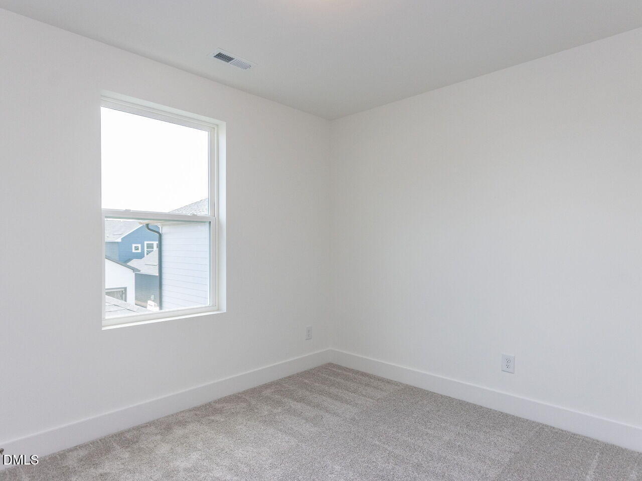 7 Tallgrass Road Pittsboro, NC 27312 - Photo 24 of 32 an empty room with a window