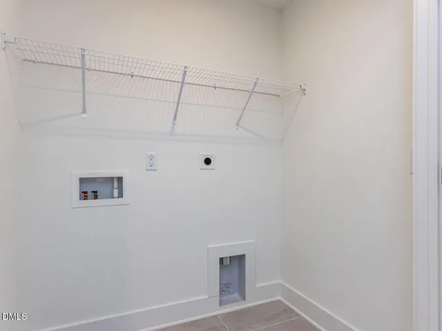 a view of a house with a porch and a garage