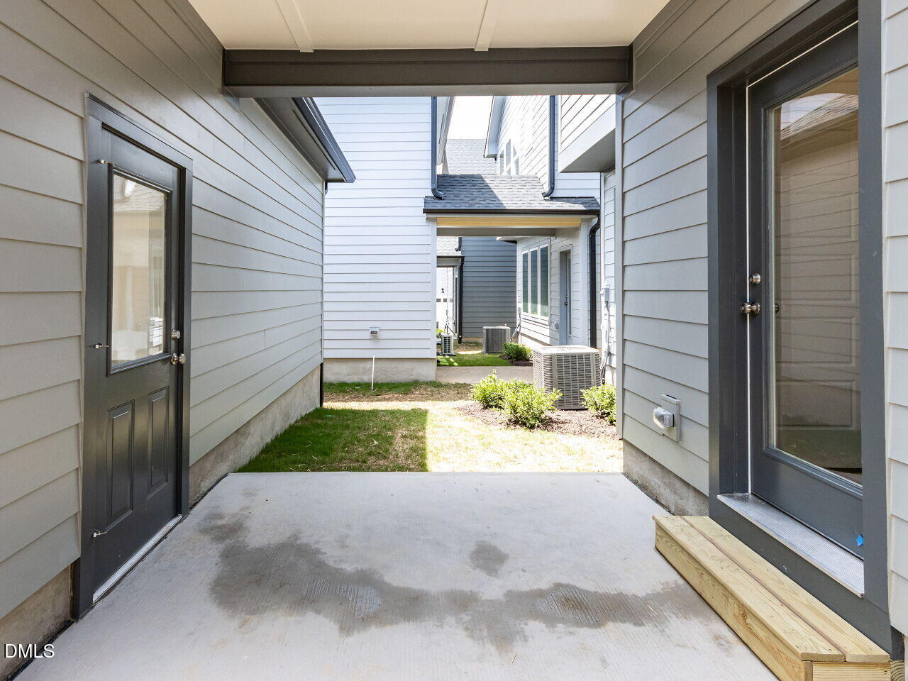 7 Tallgrass Road Pittsboro, NC 27312 - Photo 26 of 32 a view of a house with a porch and a garage