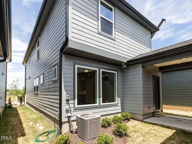 a house view with a backyard space