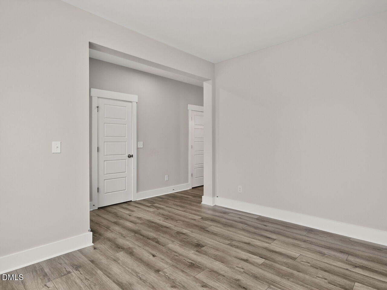 7 Tallgrass Road Pittsboro, NC 27312 - Photo 6 of 37 a view of an empty room with wooden floor and closet
