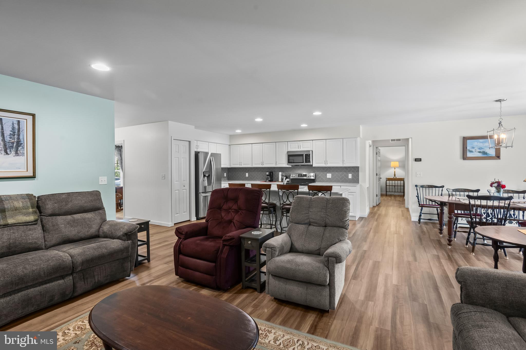 2069 Spring Wood Lane Mechanicsburg, PA 17055 - Photo 15 of 41 a living room with furniture and a wooden floor