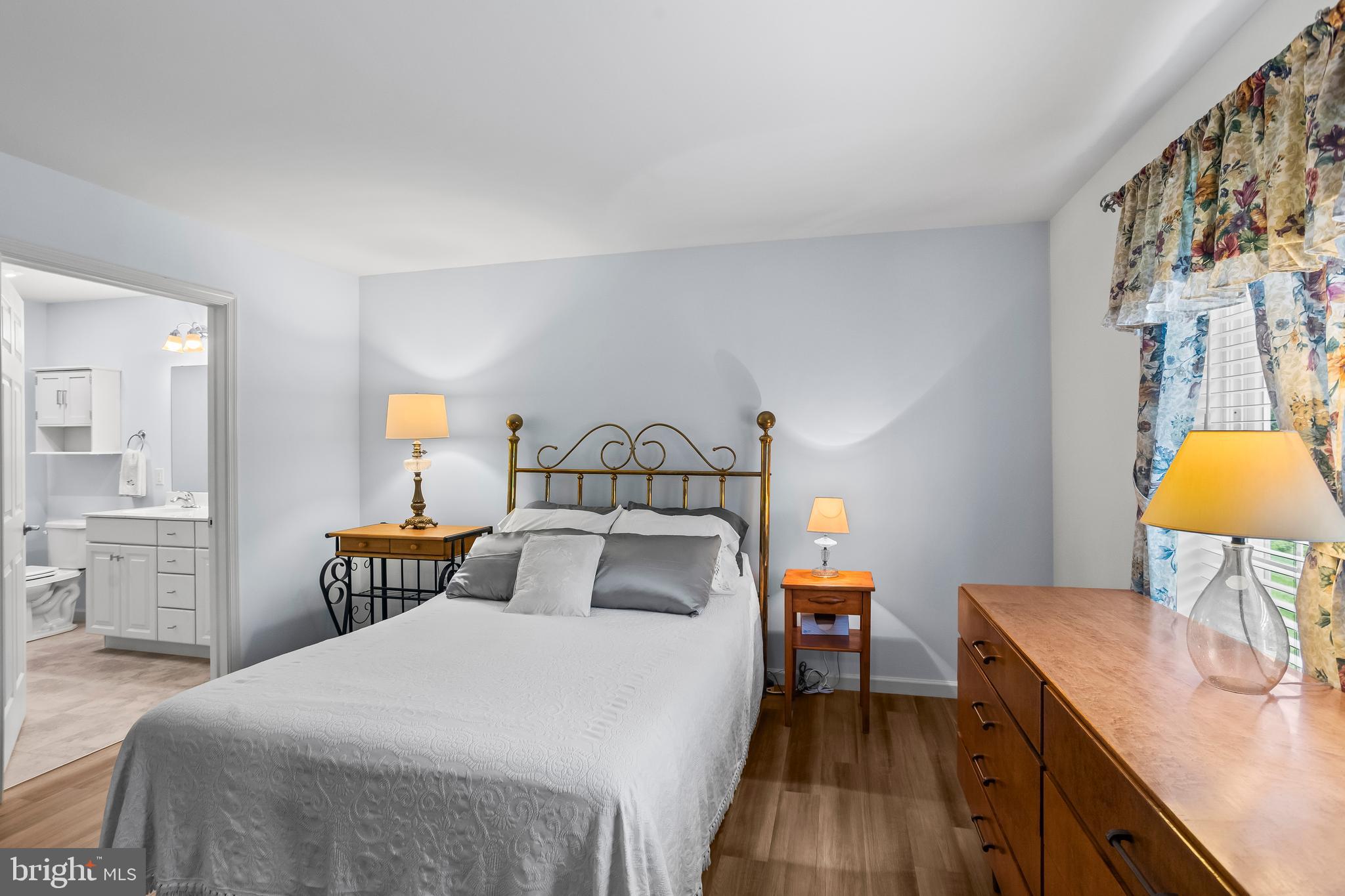 2069 Spring Wood Lane Mechanicsburg, PA 17055 - Photo 21 of 41 a bedroom with a bed and a table in it