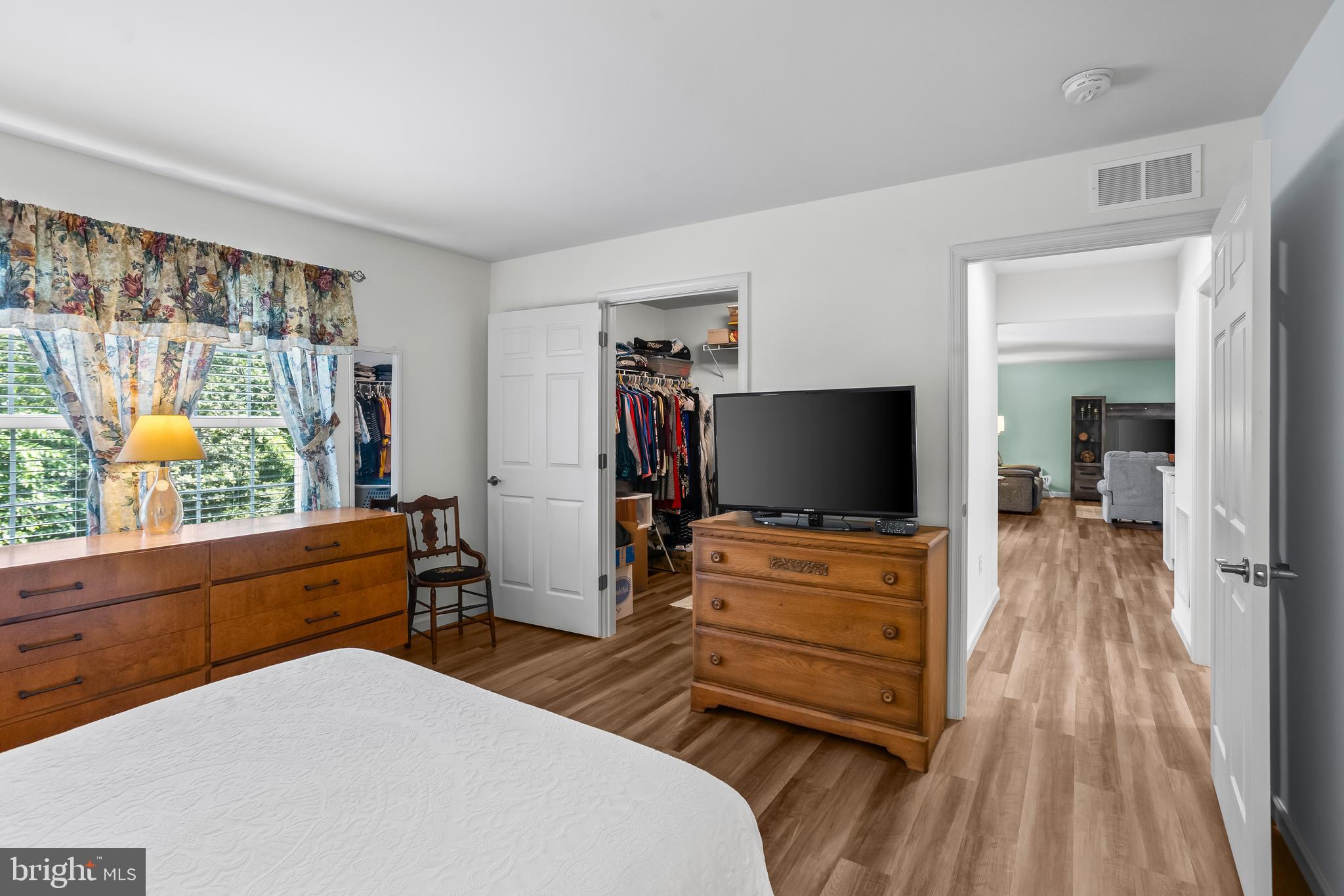2069 Spring Wood Lane Mechanicsburg, PA 17055 - Photo 22 of 41 a bedroom with a bed and a flat screen tv