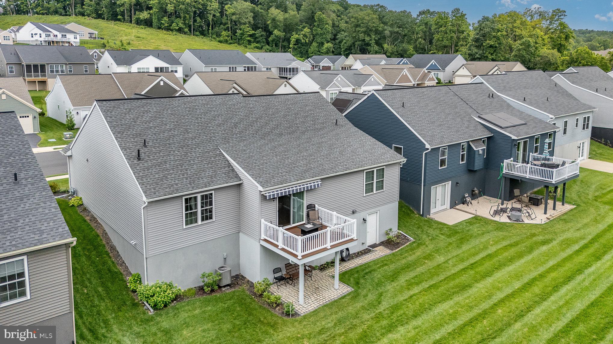 2069 Spring Wood Lane Mechanicsburg, PA 17055 - Photo 3 of 41 an aerial view of a house with swimming pool garden and patio
