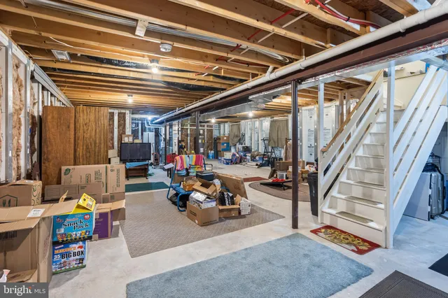 a view of a room with lots of furniture and toys