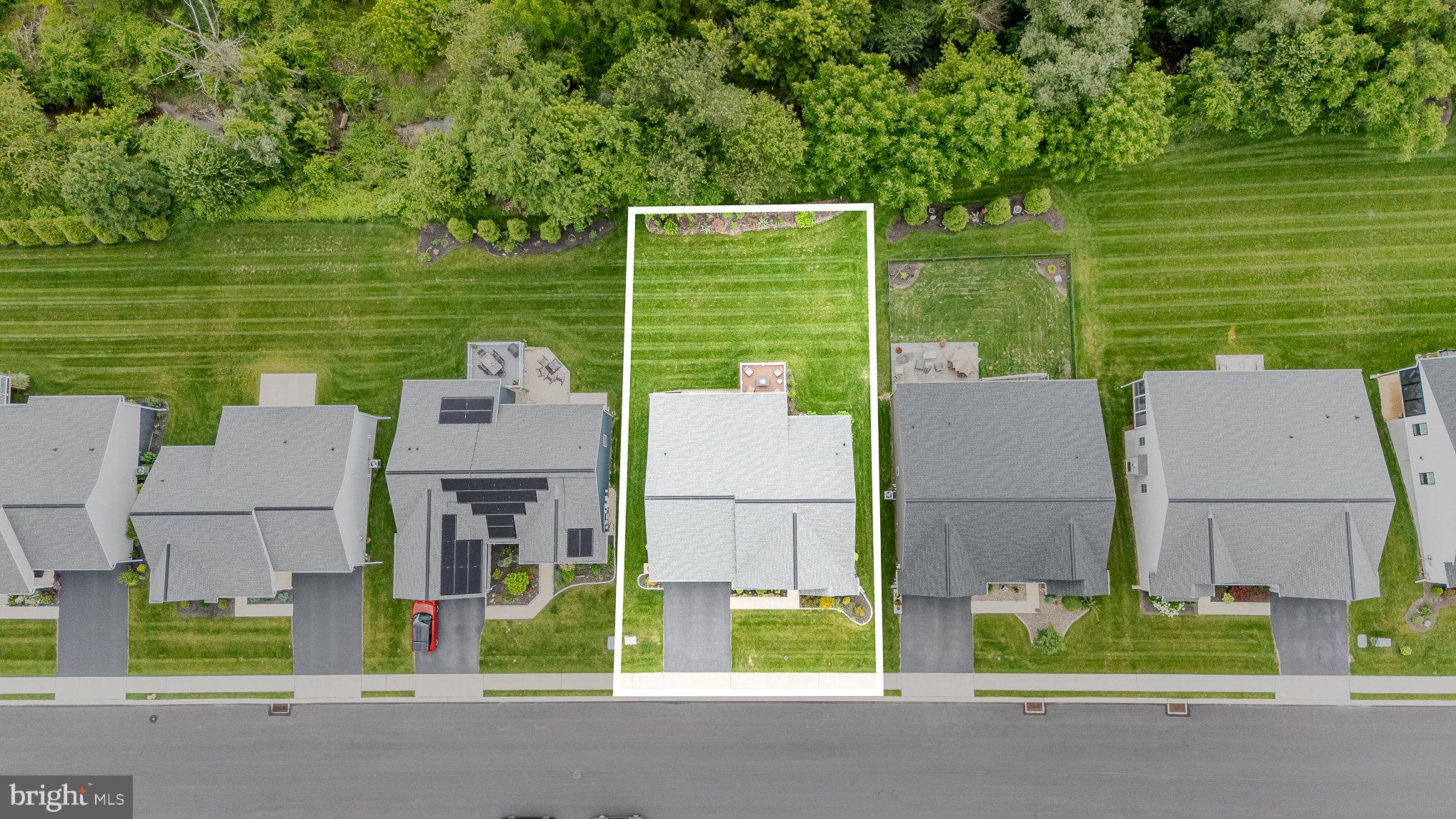 2069 Spring Wood Lane Mechanicsburg, PA 17055 - Photo 5 of 41 a view of house with outdoor space and sitting area