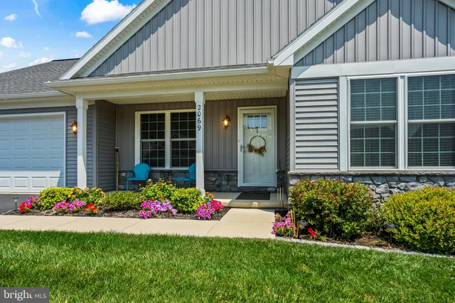 a front view of a house having yard
