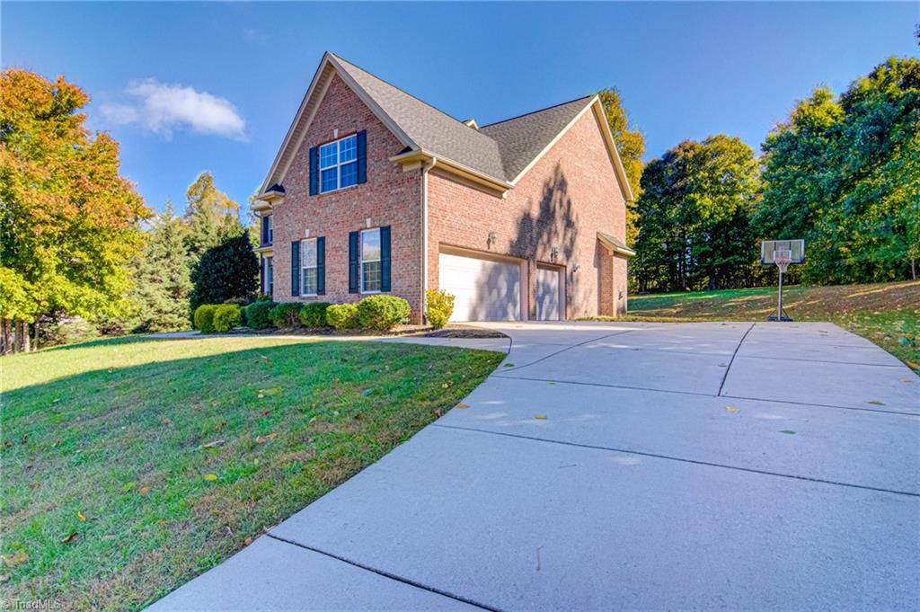 6502 Peppermill Drive Oak Ridge, NC 27310 - Photo 3 of 34