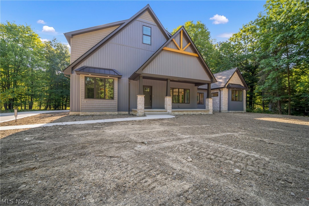 4009 Brainard Road Beachwood, OH 44122 - Photo 2 of 50 View of front of house with a porch