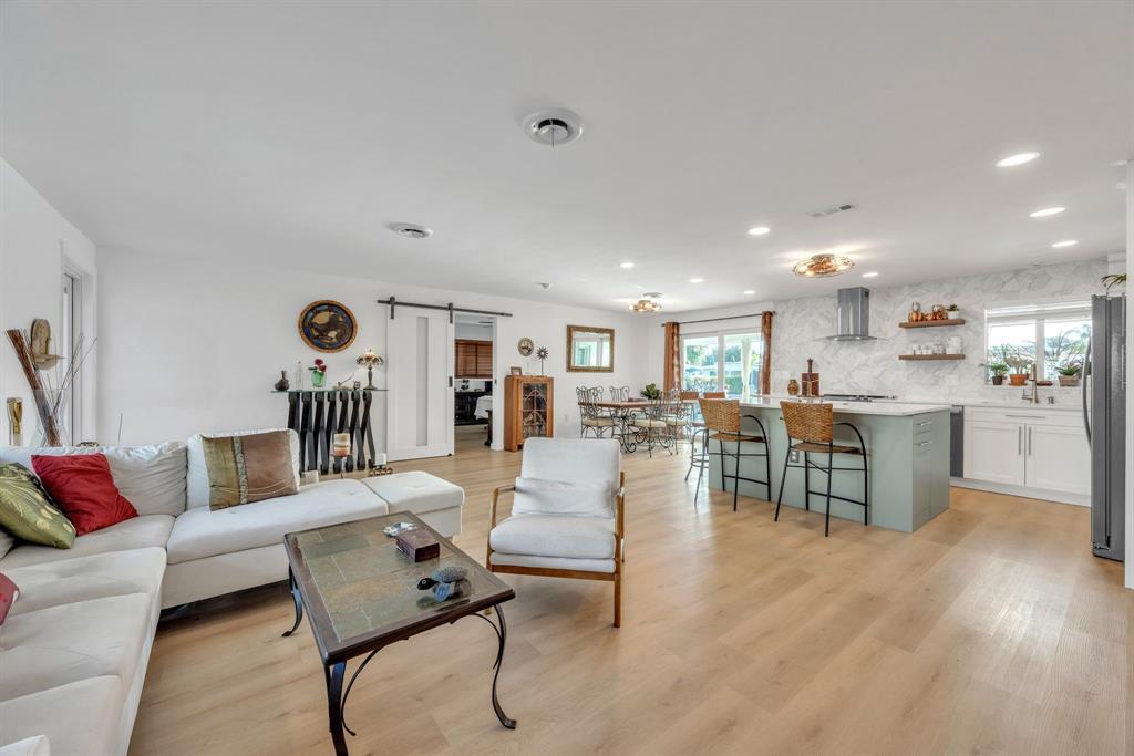 1611 Southwest 3rd Avenue Pompano Beach, FL 33060 - Photo 16 of 35 a living room with furniture and kitchen view