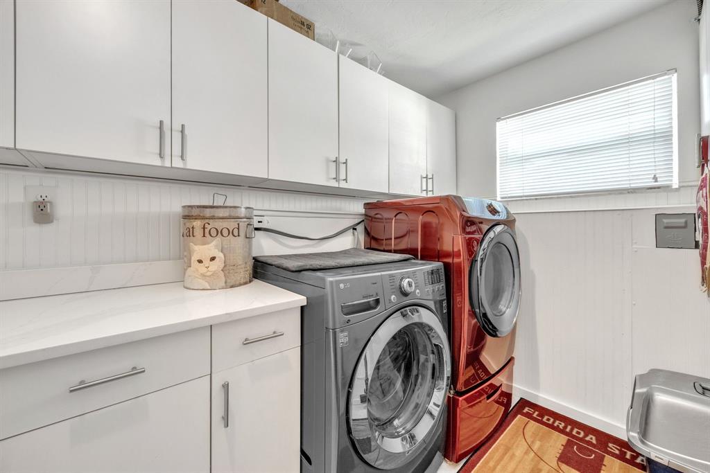 1611 Southwest 3rd Avenue Pompano Beach, FL 33060 - Photo 24 of 35 a utility room with dryer and washer