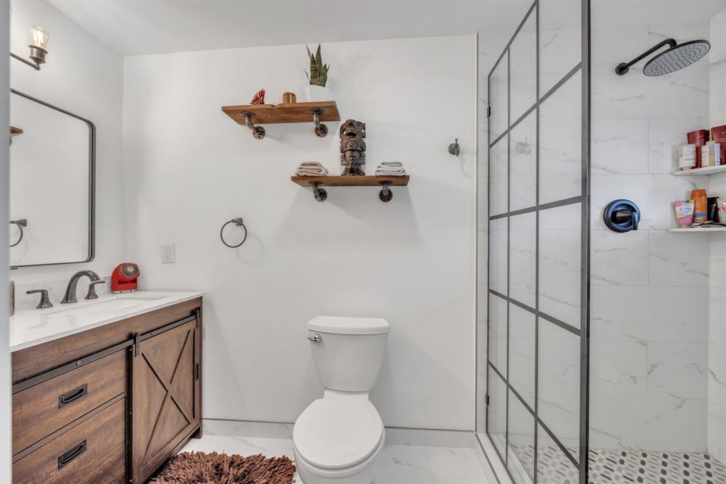 1611 Southwest 3rd Avenue Pompano Beach, FL 33060 - Photo 25 of 35 a bathroom with a sink toilet and shower