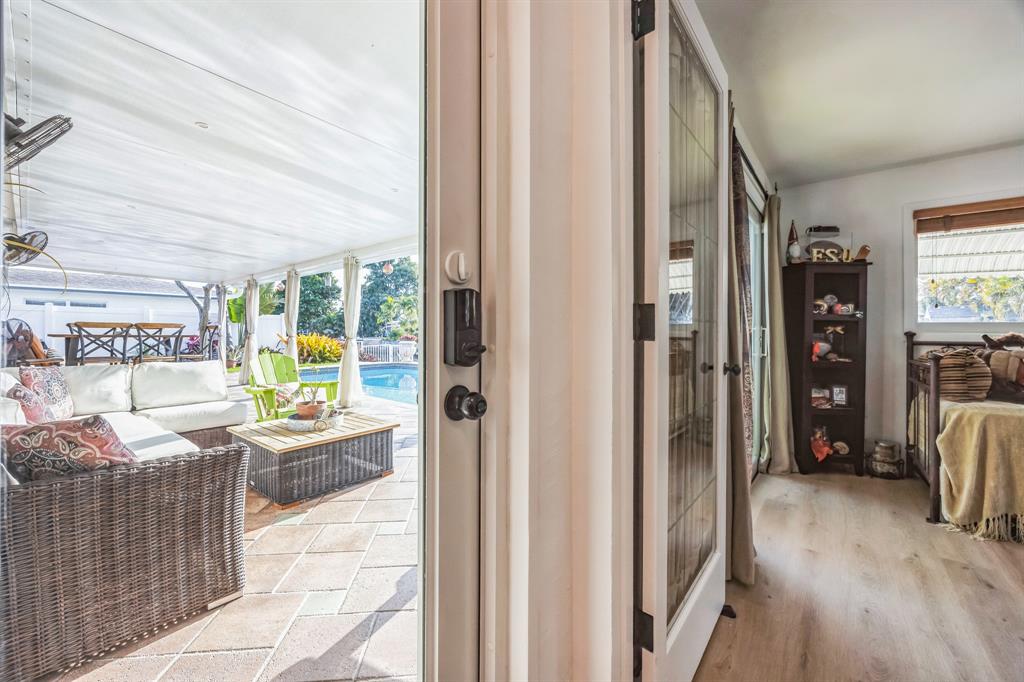 1611 Southwest 3rd Avenue Pompano Beach, FL 33060 - Photo 27 of 35 a view of a hallway view with living room and furniture