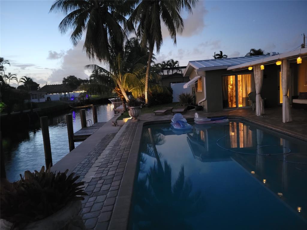 1611 Southwest 3rd Avenue Pompano Beach, FL 33060 - Photo 30 of 35 a view of entryway and hall with wooden floor