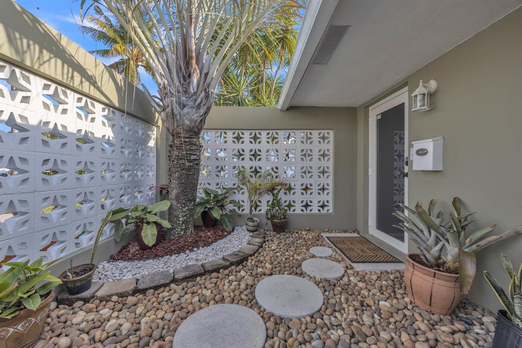 1611 Southwest 3rd Avenue Pompano Beach, FL 33060 - Photo 7 of 35 a view of a porch with furniture