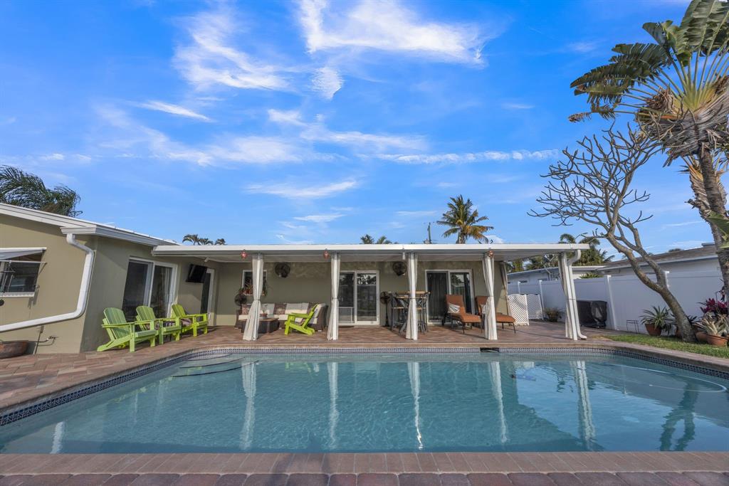 1611 Southwest 3rd Avenue Pompano Beach, FL 33060 - Photo 9 of 35 a view of a house with a backyard