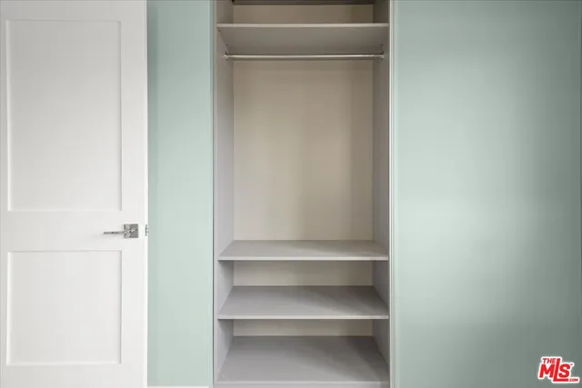 a view of a house with large windows