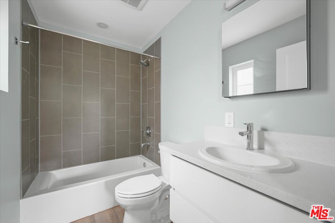 1317 Punta Gorda Street, Unit 9 Santa Barbara, CA 93103 - Photo 24 of 70 a bathroom with a sink toilet and shower