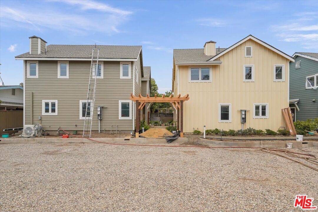 1317 Punta Gorda Street, Unit 9 Santa Barbara, CA 93103 - Photo 32 of 70 a view of a house with large windows