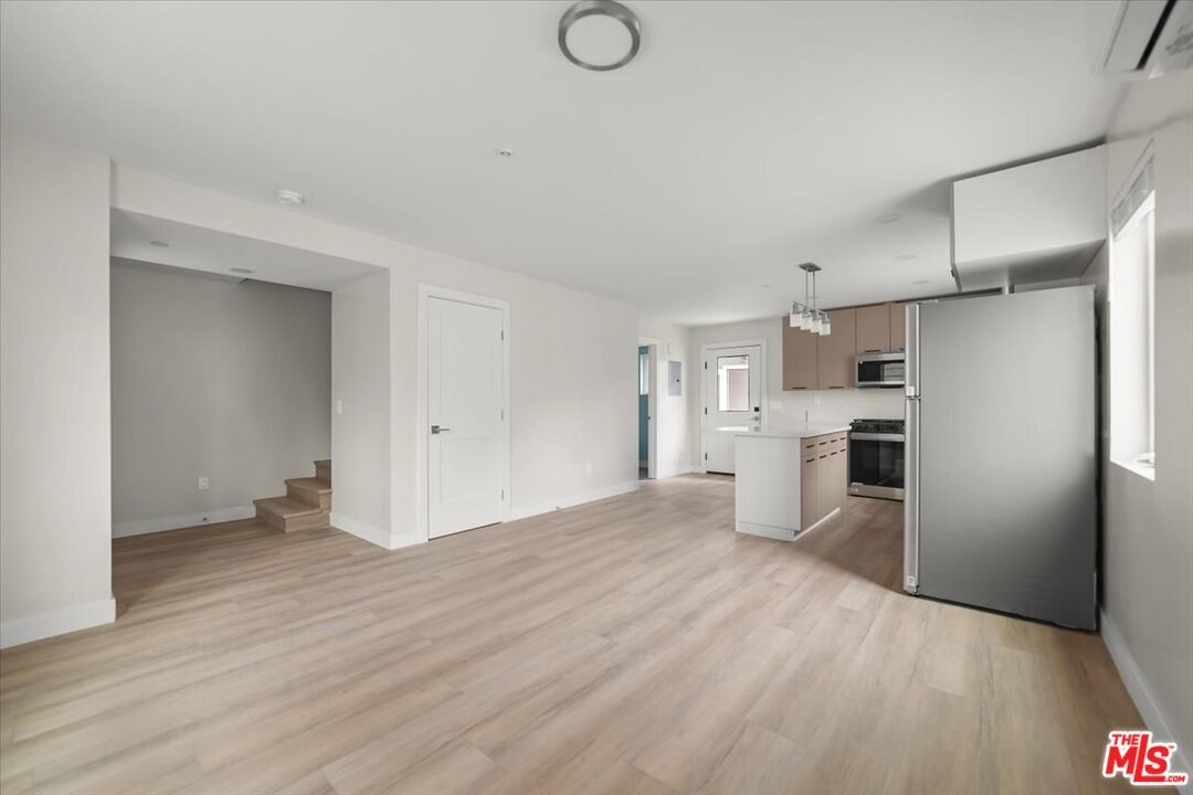 1317 Punta Gorda Street, Unit 9 Santa Barbara, CA 93103 - Photo 5 of 70 a view of kitchen with stainless steel appliances refrigerator oven and cabinets