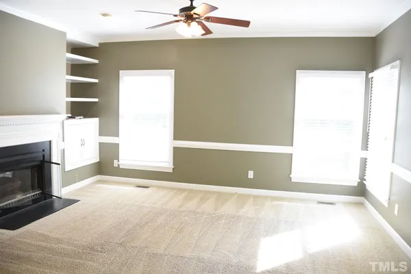 a view of a livingroom with a fireplace