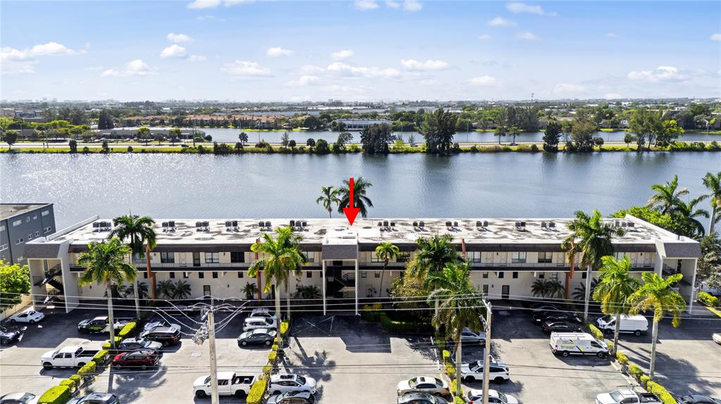 1100 Crystal Lake Drive, Unit 209 Deerfield Beach, FL 33073 - Photo 25 of 34 a view of a lake