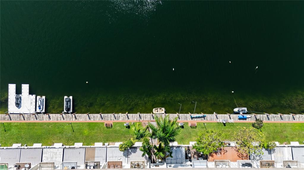 1100 Crystal Lake Drive, Unit 209 Deerfield Beach, FL 33073 - Photo 31 of 34 a view of house with a yard