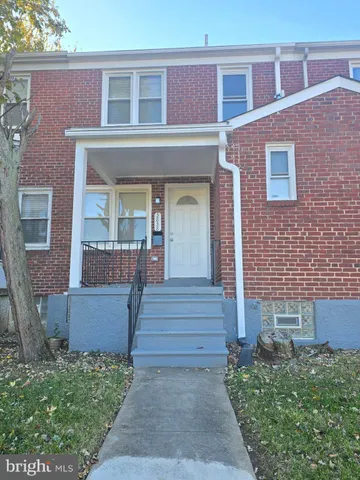 a view of kitchen and a window
