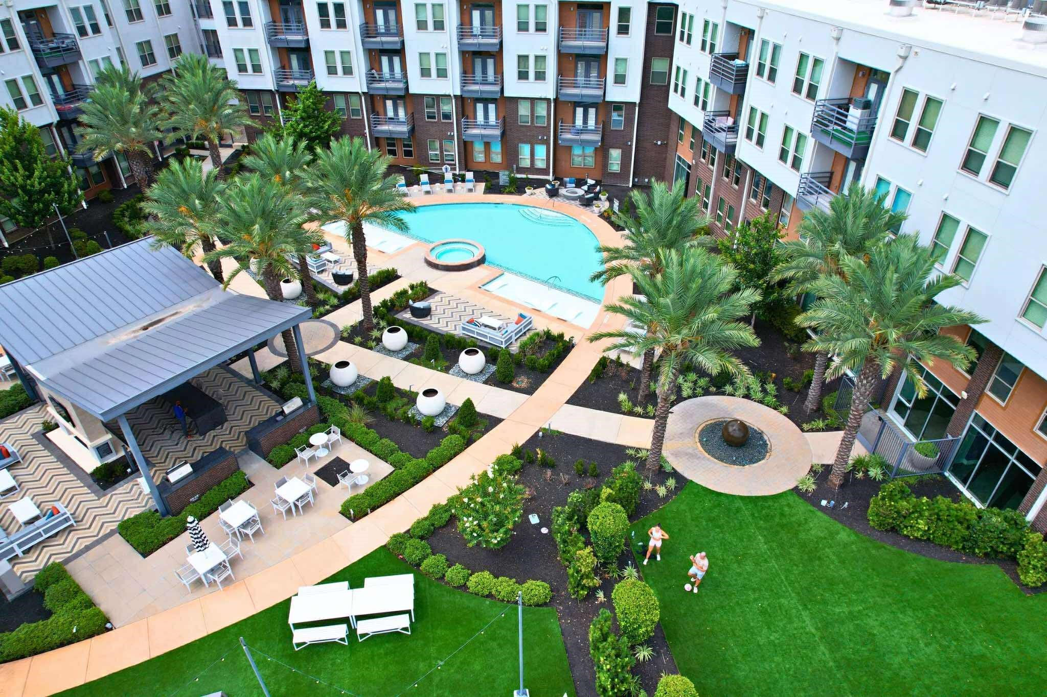 23233 Western Centre Drive, Unit A1 60 Katy, TX 77494 - Photo 2 of 15 an aerial view of multiple houses with yard