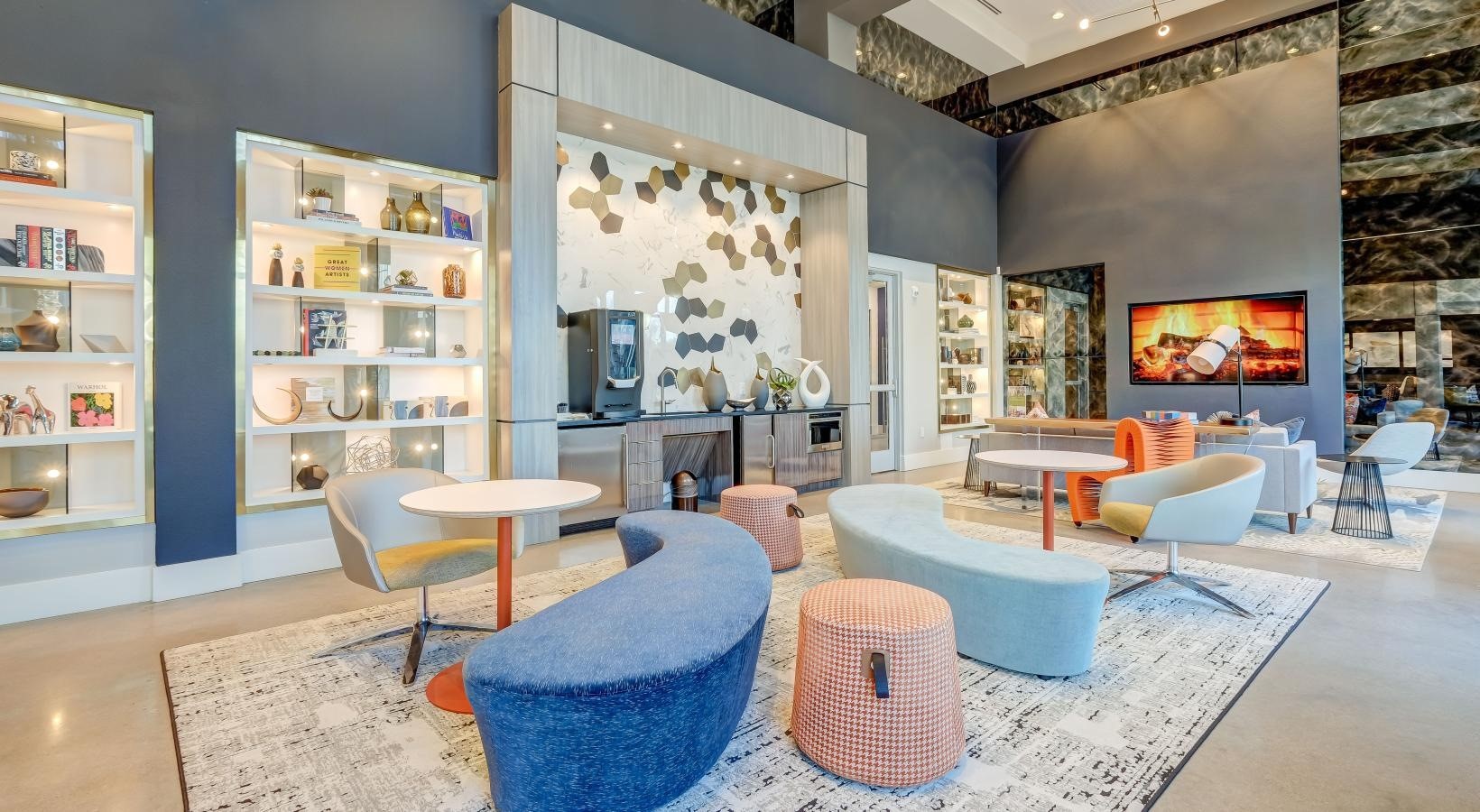 23233 Western Centre Drive, Unit A1 60 Katy, TX 77494 - Photo 8 of 15 a living room with fireplace furniture and a flat screen tv