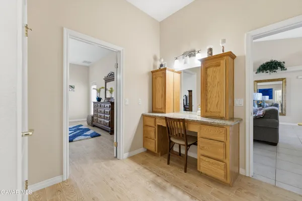 a view of living room and kitchen