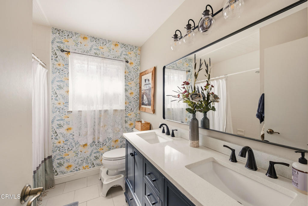 616 Island View Street Fillmore, CA 93015 - Photo 21 of 57 a bathroom with a sink and a mirror