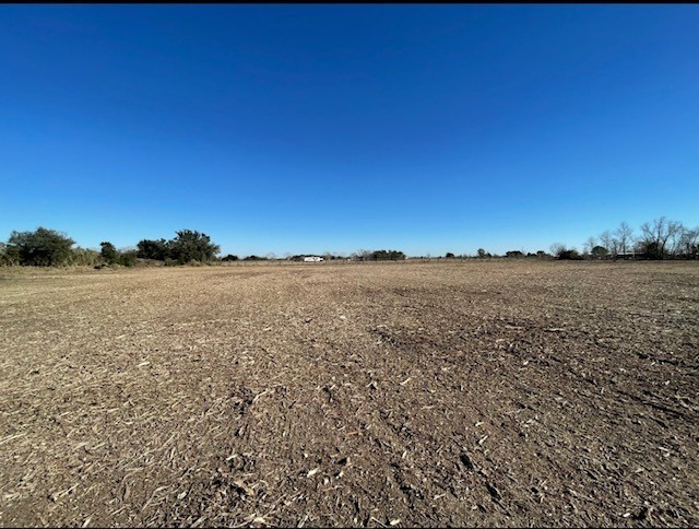 22099 Sattler Road Winnie, TX 77665 - Photo 19 of 20 a view of lake and mountain