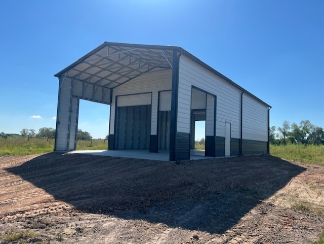 22099 Sattler Road Winnie, TX 77665 - Photo 2 of 20 a view of a house with a yard