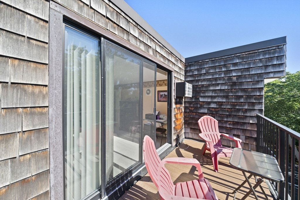 9 Broadway, Unit 305 Saugus, MA 01906 - Photo 16 of 32 a front view of a house with outdoor seating