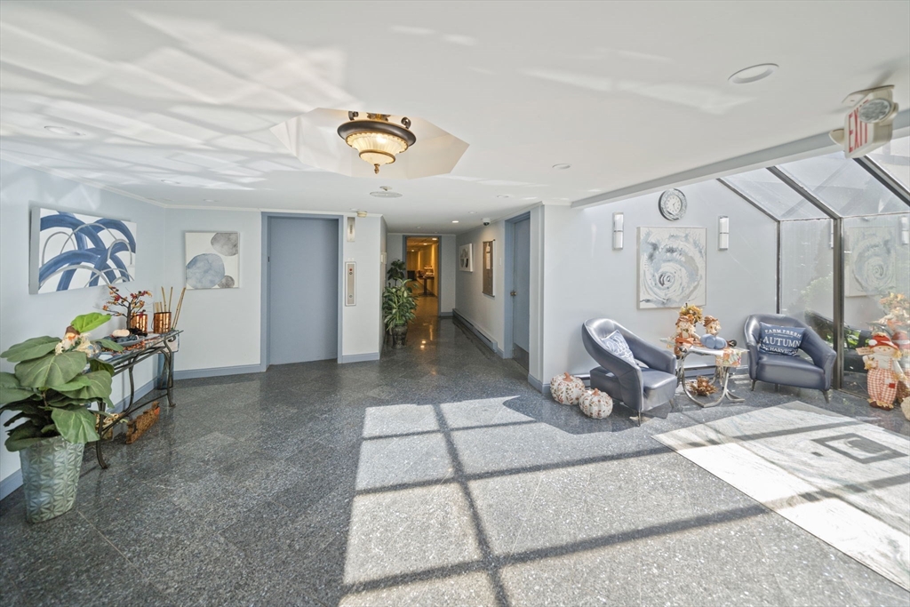 9 Broadway, Unit 305 Saugus, MA 01906 - Photo 23 of 32 a view of a room with gym equipment