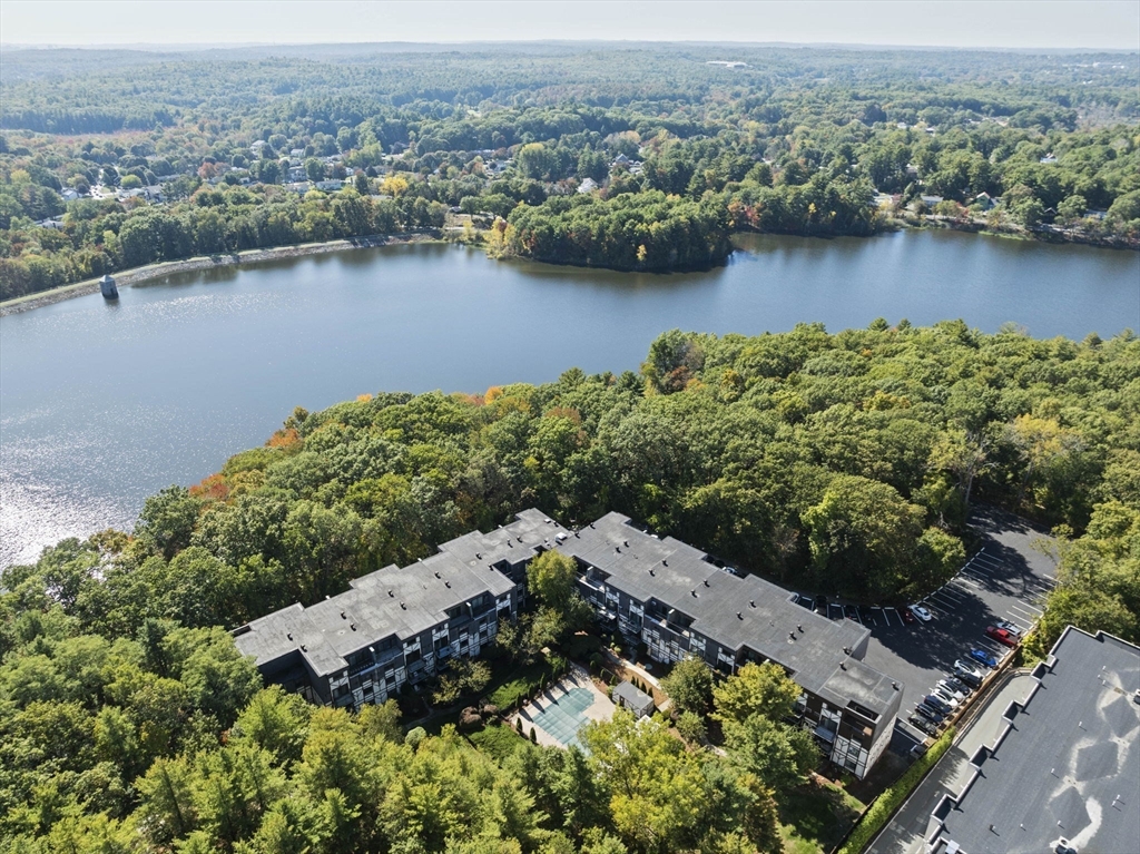 9 Broadway, Unit 305 Saugus, MA 01906 - Photo 27 of 32 an aerial view of a houses with a lake view
