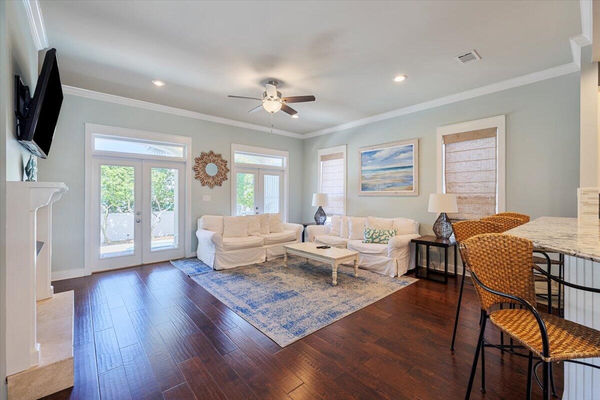3581 Waverly Circle Destin, FL 32541 - Photo 12 of 33 a living room with fireplace furniture and a flat screen tv