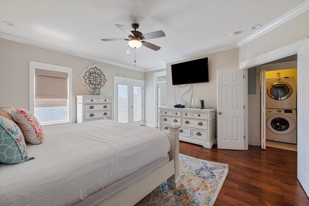 3581 Waverly Circle Destin, FL 32541 - Photo 24 of 33 a bedroom with a bed and a flat screen tv